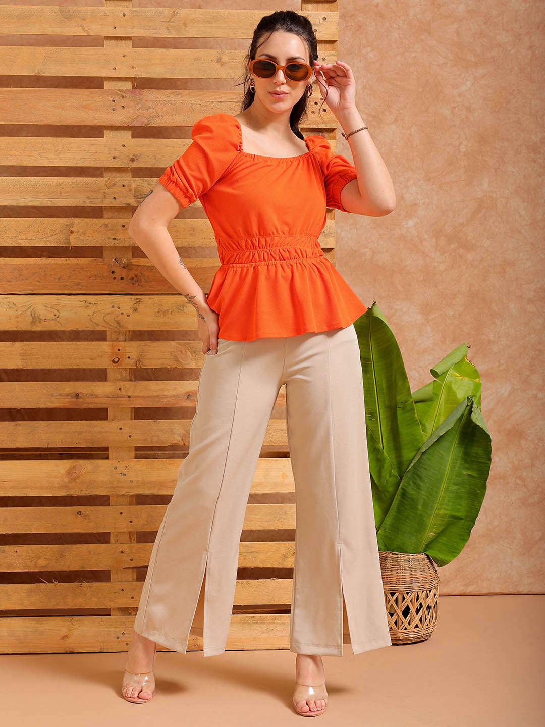 Shop Women's Orange Fit and Flare Textured Peplum Top Online.