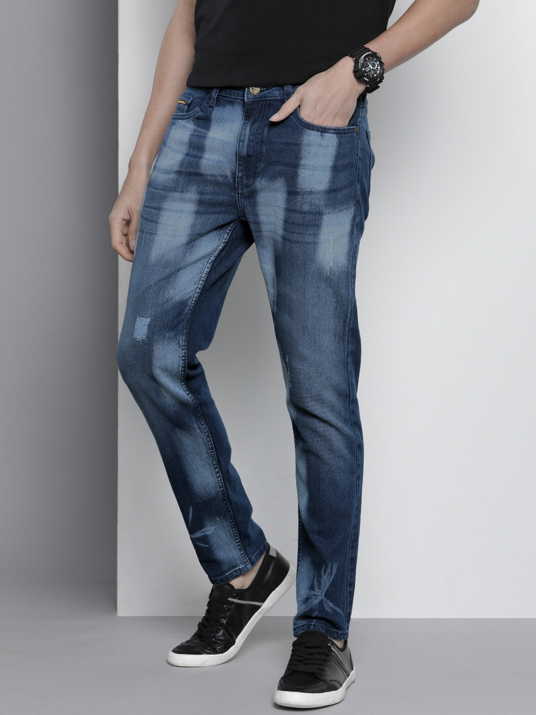 Shop Men Distressed Slim Jeans Online.