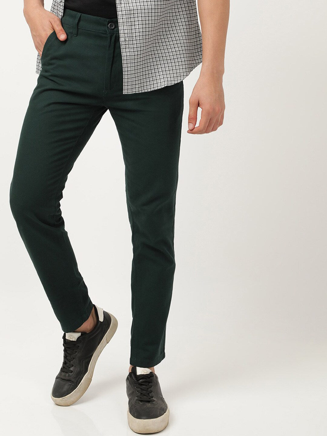 Shop Men Solid Mid-Rise Chinos Online.