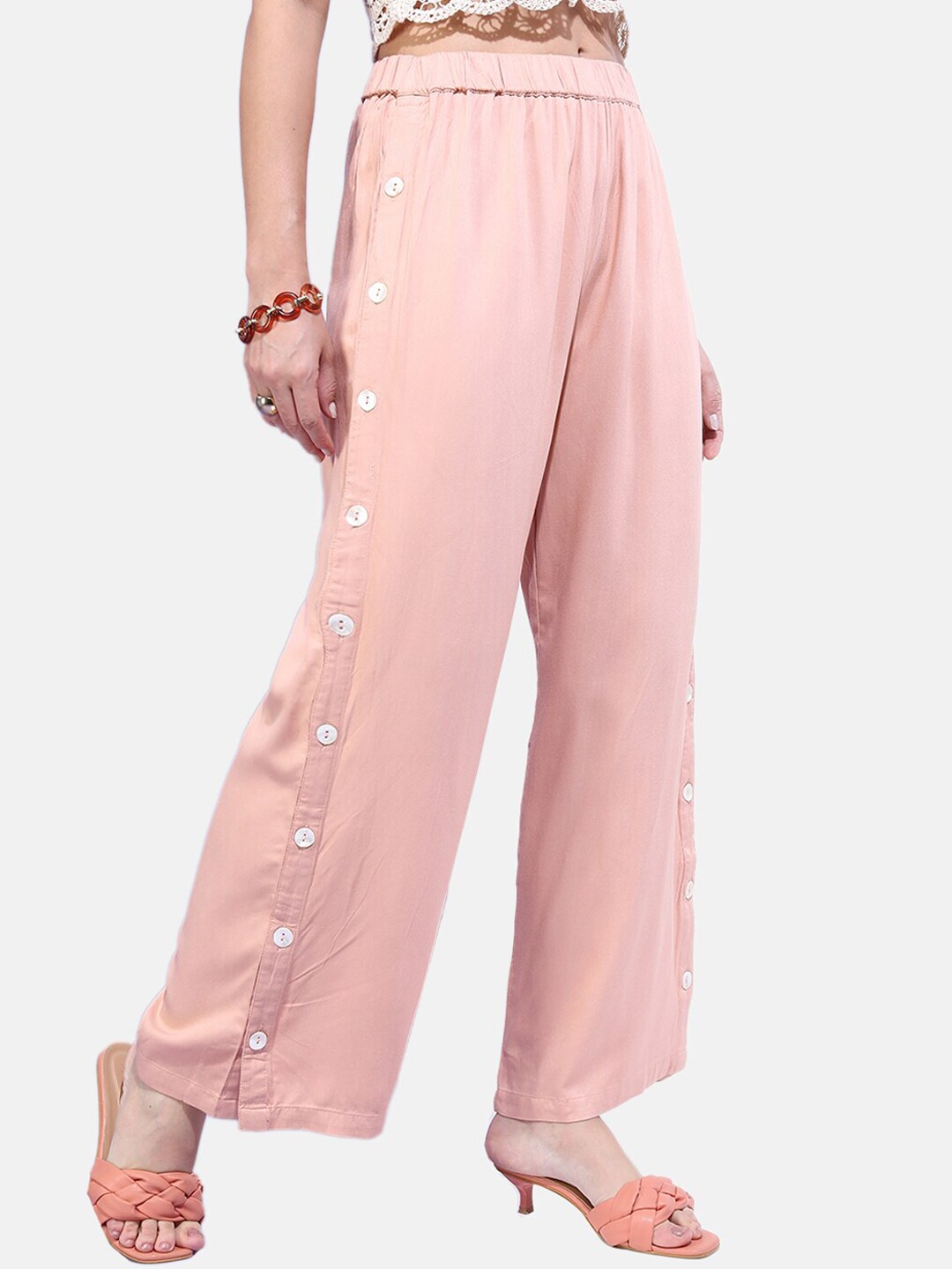 Shop Women Solid Buttoned Wide Leg Pants Online.